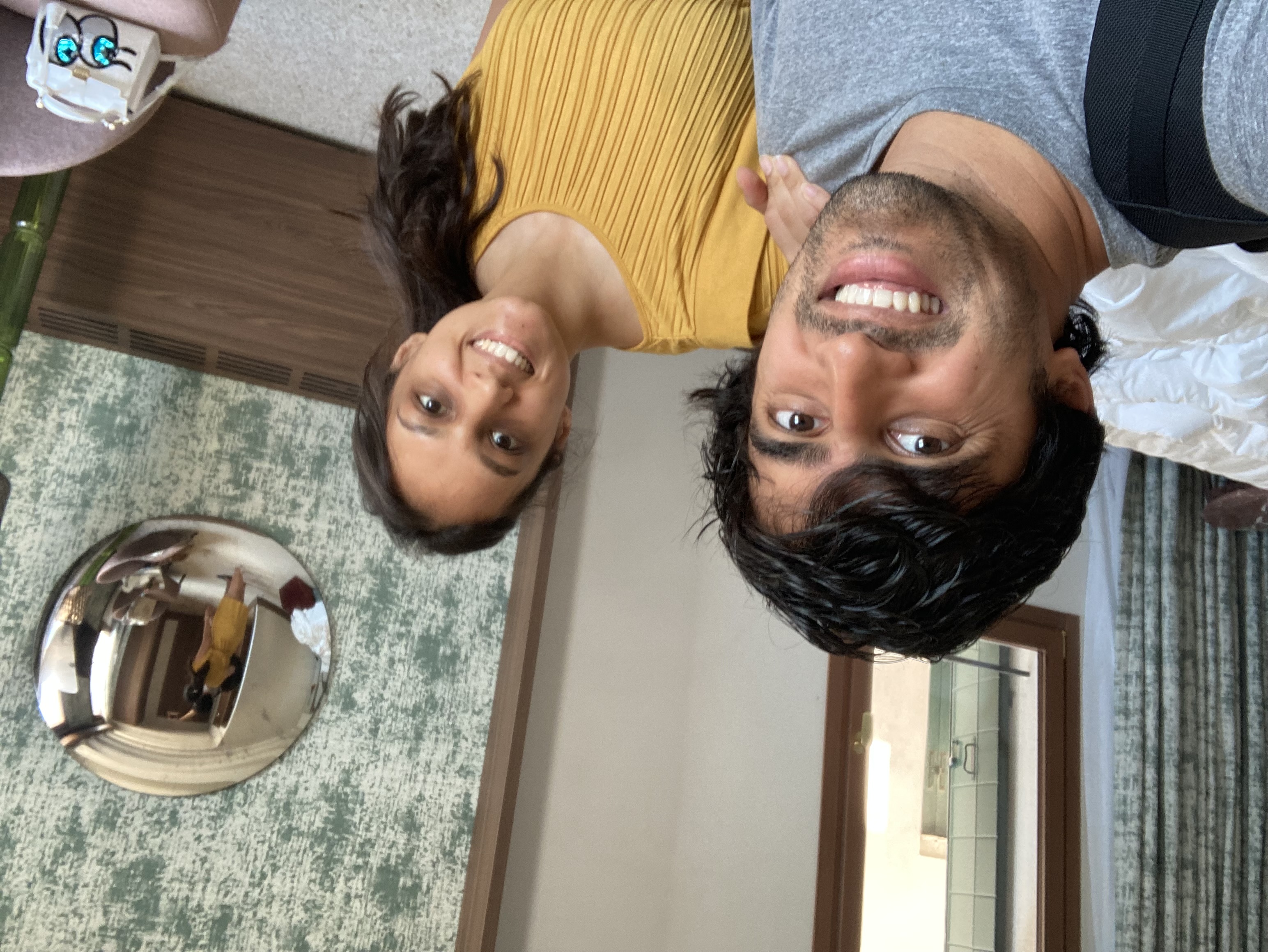 Ca' di Dio room interior with green wallpaper and contemporary furnishings